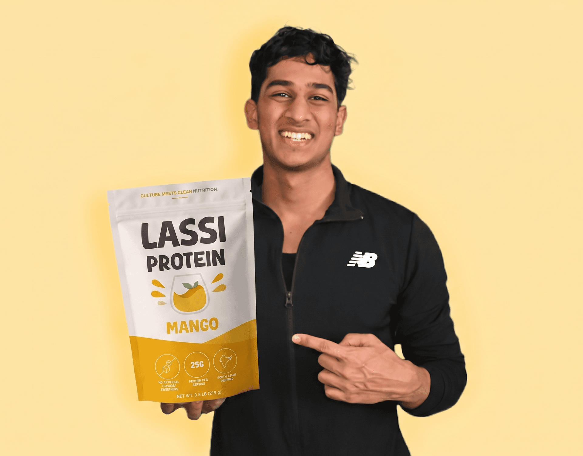 Arpan pointing at a Lassi Protein pouch