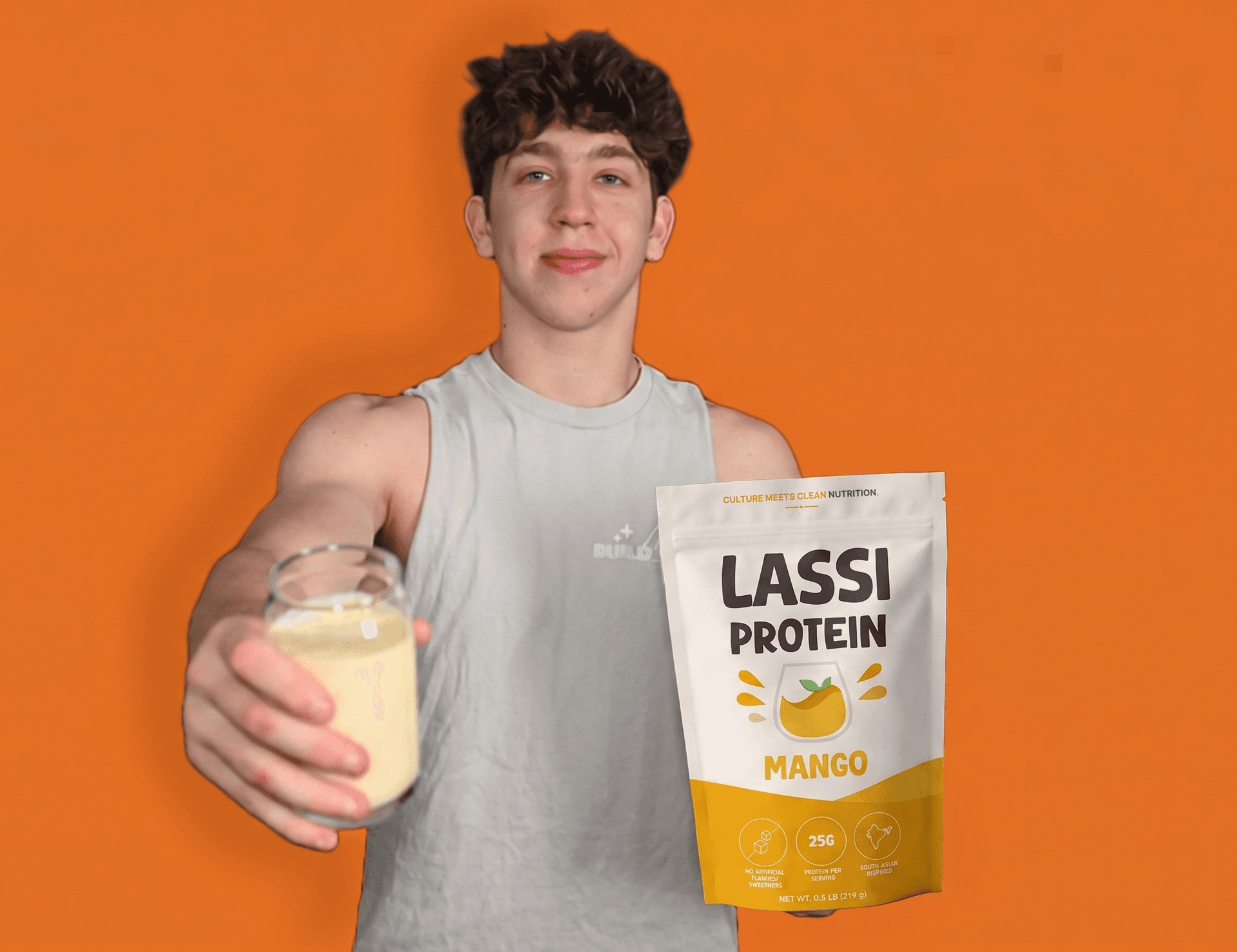 Jeff holding a Lassi Protein pouch and drink