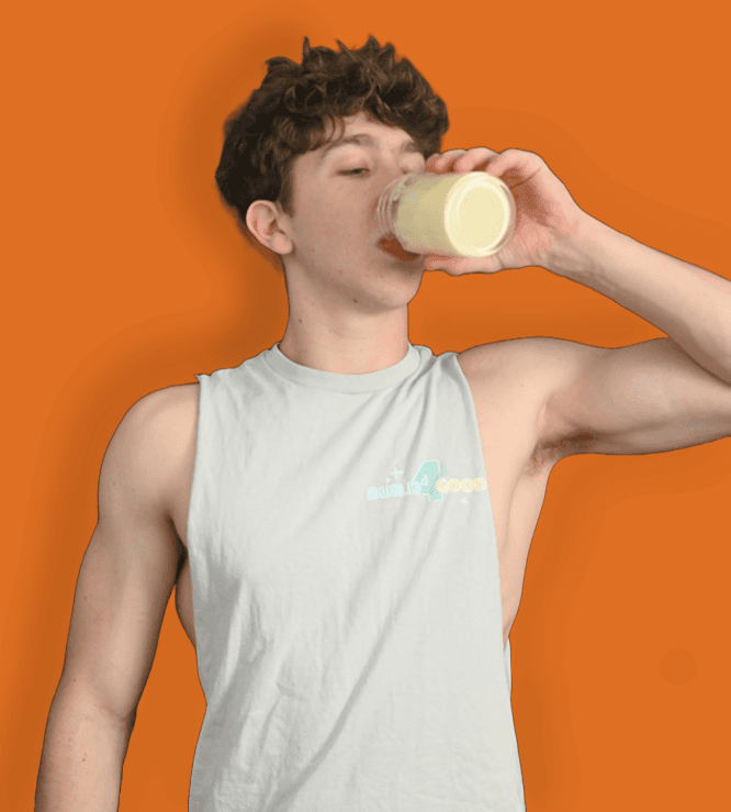 Customer drinking a mango lassi protein shake